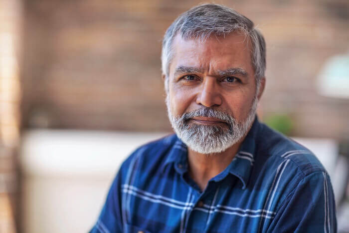 Concerned male patient looking into camera.
