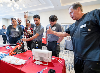 EMTs testing medical equipment