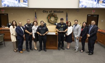 Group photo of hometown hero award presentation