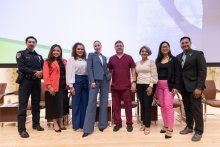 Local mental health experts stand together for a panel