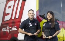 Edgar Gonzalez, EMT-Basic, and Brooklyn Avila, EMT-Basic, receive their Hometown Heroes Award