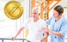A physical therapist assisting a patient 