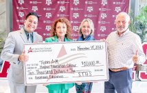 STHS McAllen Representatives standing with donation check