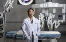 Photo of Dr. Kim in a surgical suite