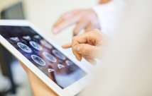 Doctors reviewing scans of a brain