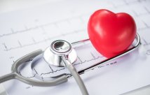 Stethoscope with a red heart shaped stress ball